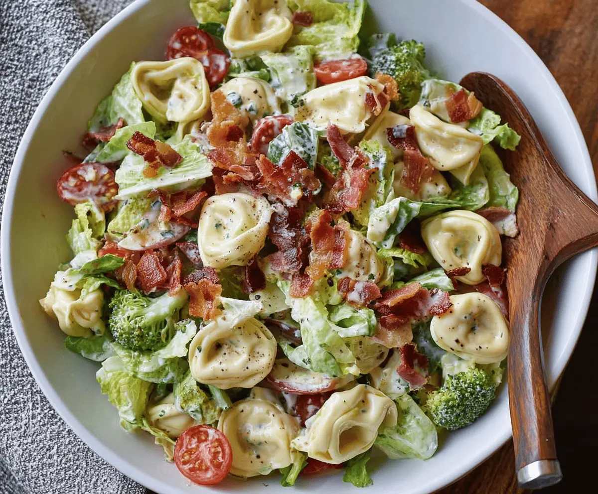 Colorful Broccoli BLT Tortellini Salad with crispy bacon, fresh broccoli, and creamy dressing served in a bowl