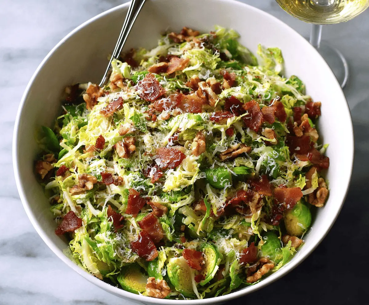 Shaved Brussels Sprout Salad with Crispy Bacon, Parmesan, and Toasted Walnuts