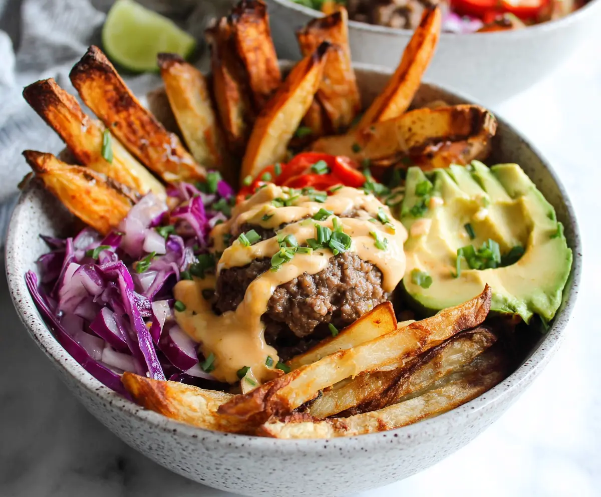 Delicious Burger Bowls with crispy fries, perfect for Whole30 diet, showcasing fresh ingredients and flavorful toppings.