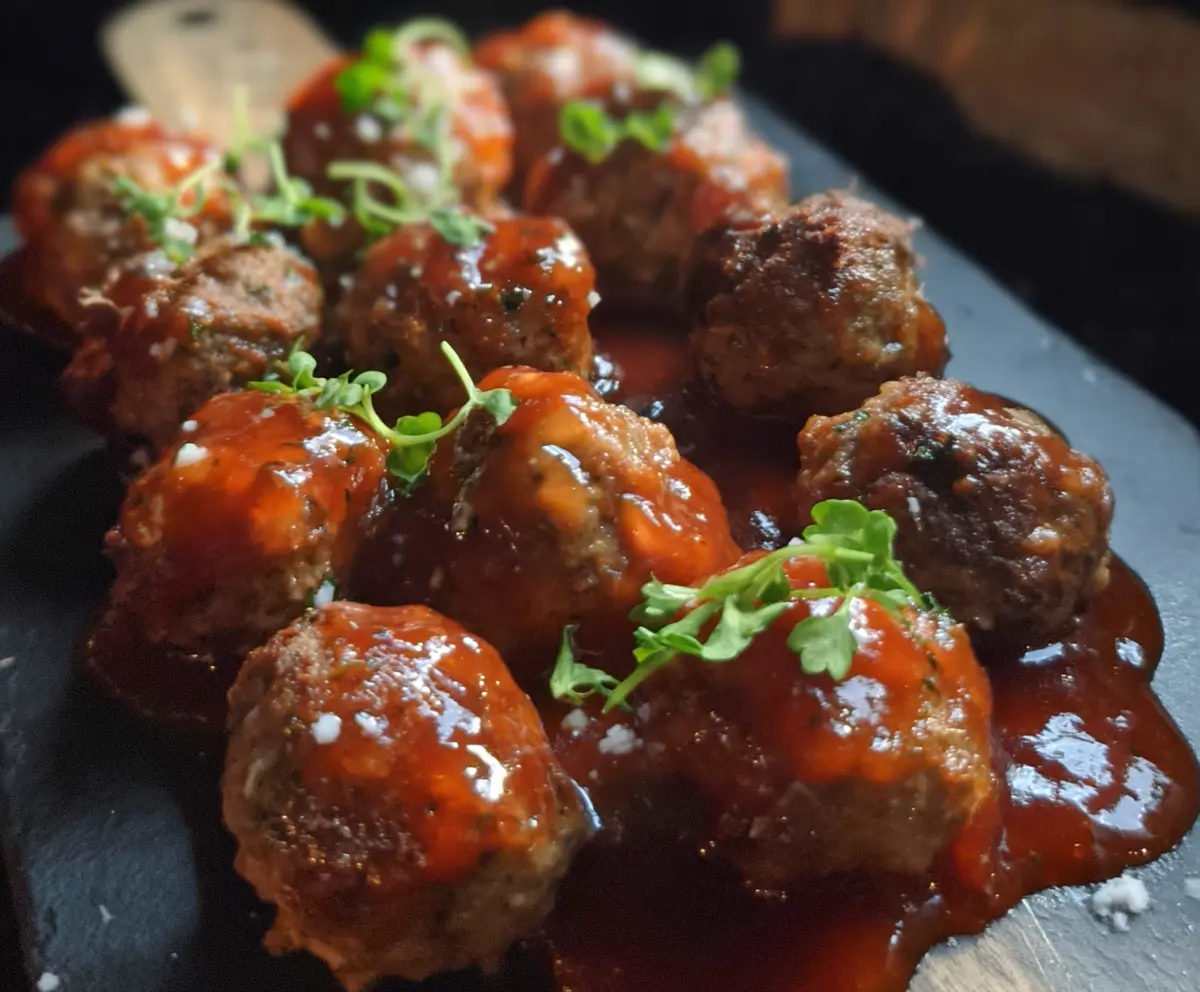 Delicious Cape Cod Cocktail Meatballs served on a platter, perfect for parties and gatherings.
