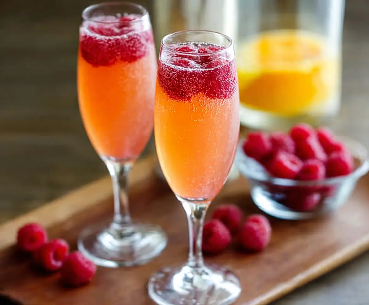 Chilled Champagne Punch Bellini with fresh fruit and elegant presentation for a celebration.