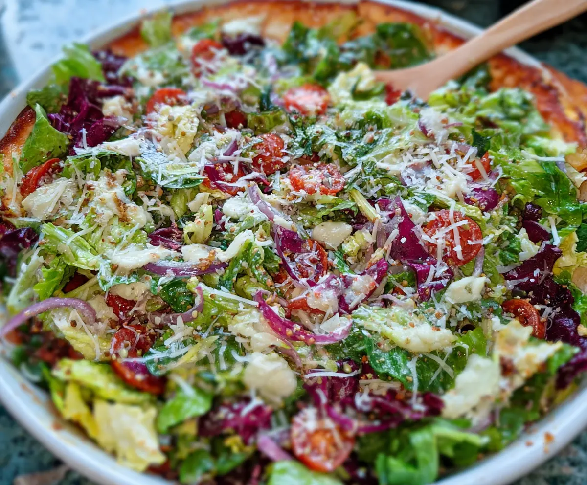 Fresh Pizza Night Salad with cherry tomatoes, cucumbers, and greens for a healthy dinner option