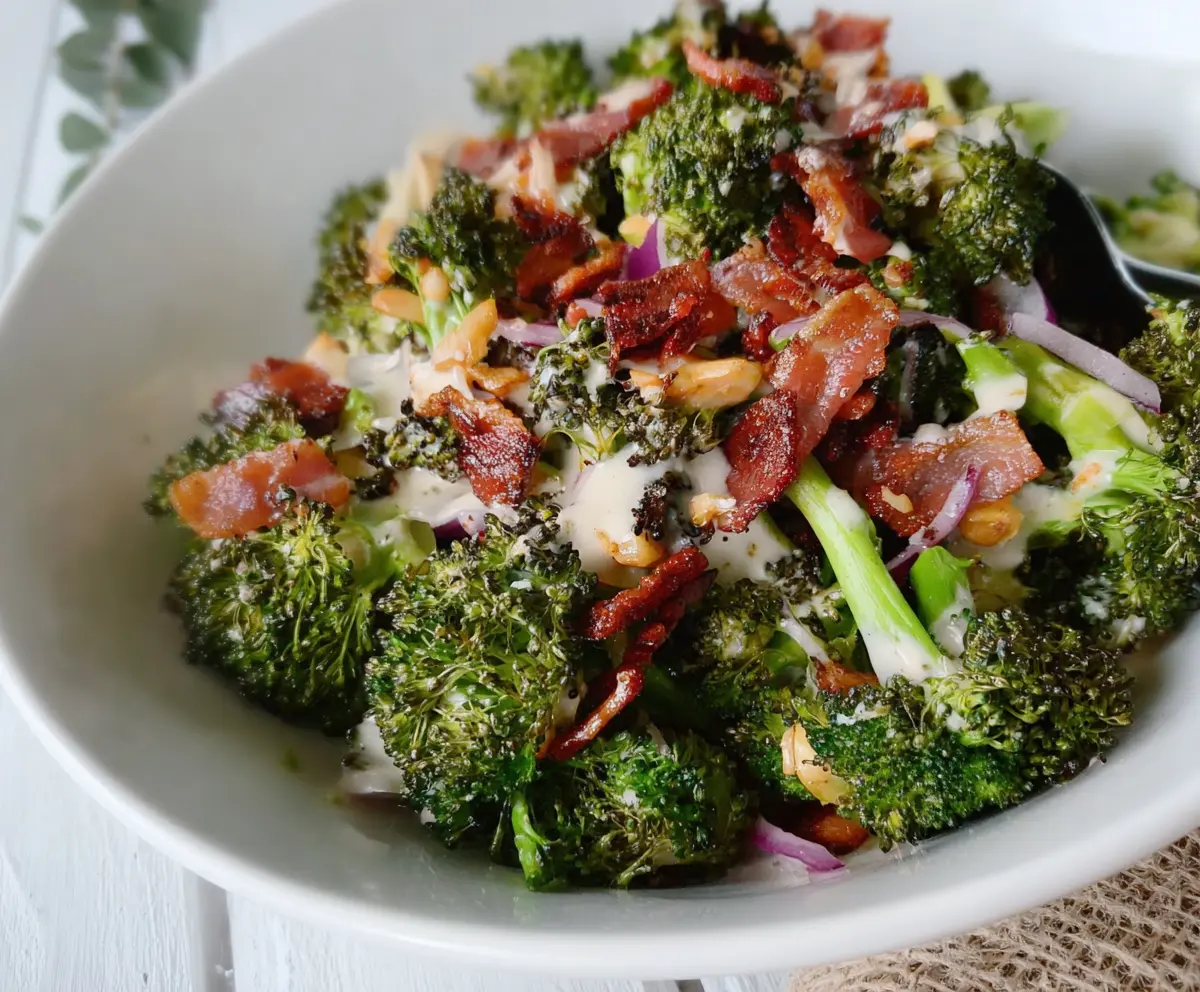 Delicious roasted broccoli bacon crunch salad with fresh greens and crispy toppings illustrating healthy eating.